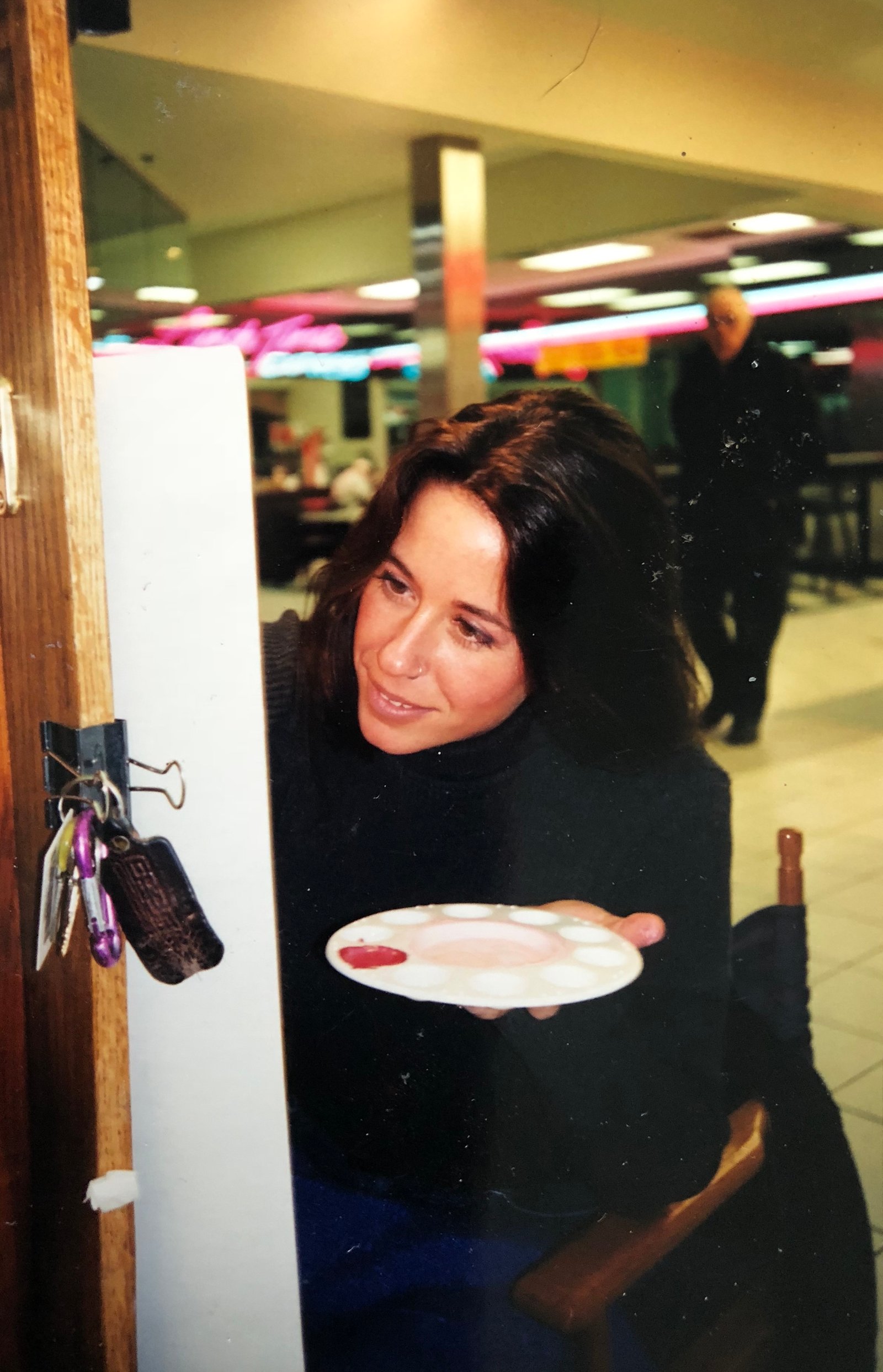 Heather Collins with a finished painting