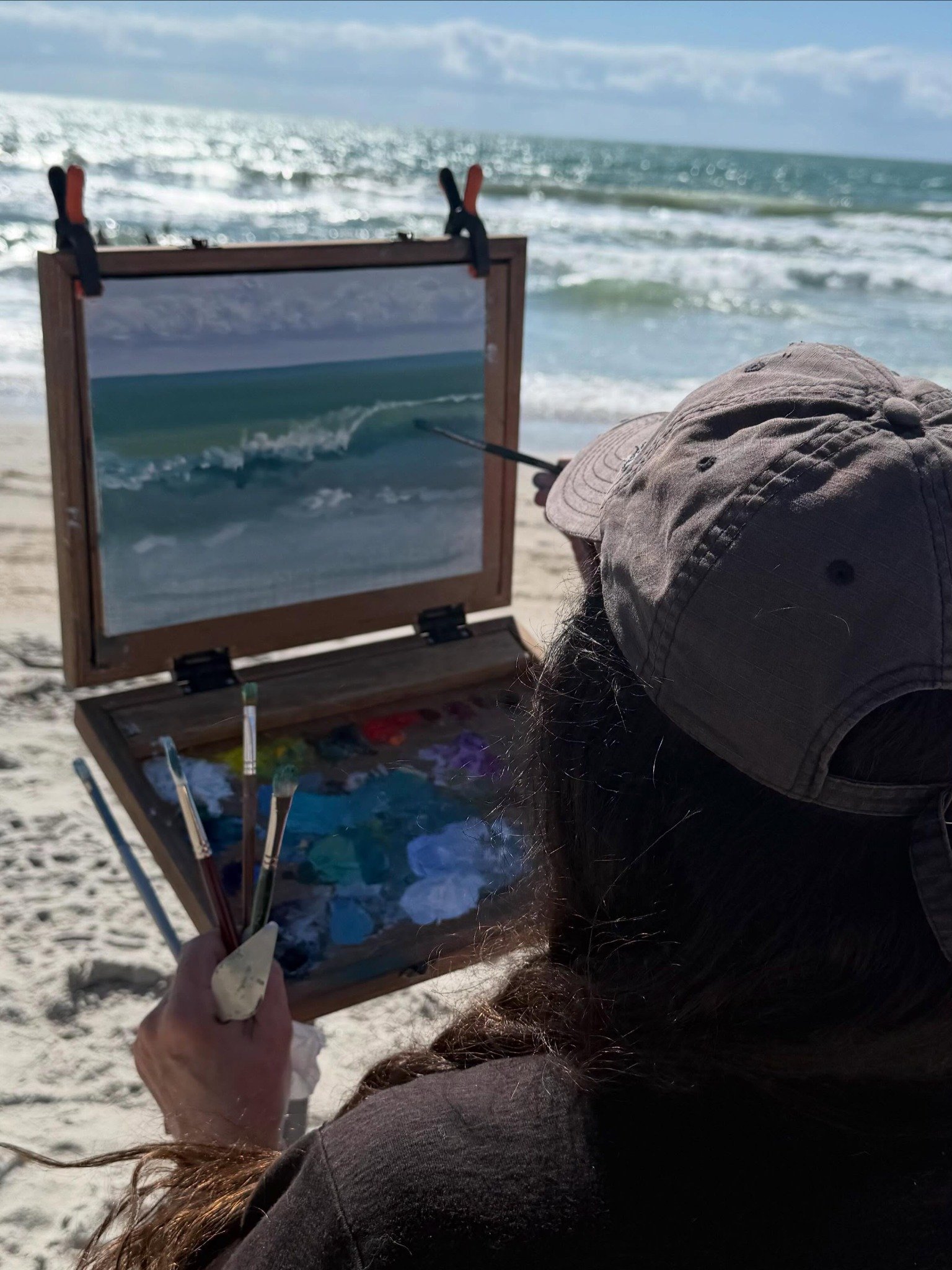 Heather Collins painting en plein air at the beach
